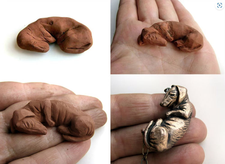 miniature sculpture of a miniature bronze wienerdog