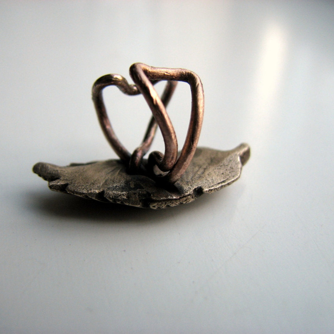 baksida fjaderearcuff