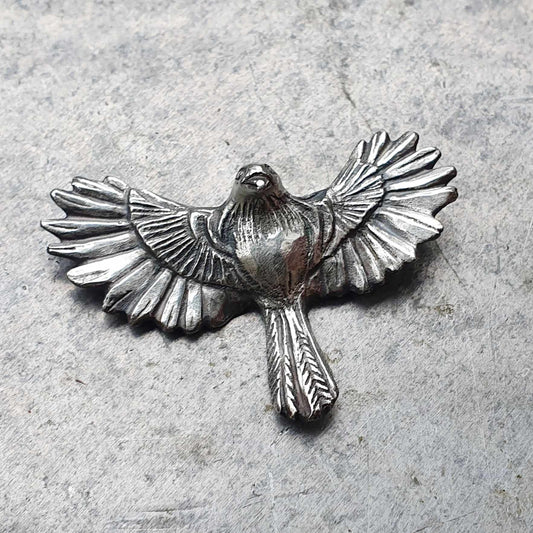 Solid sterling silver necklace with aflying bird with spread wings