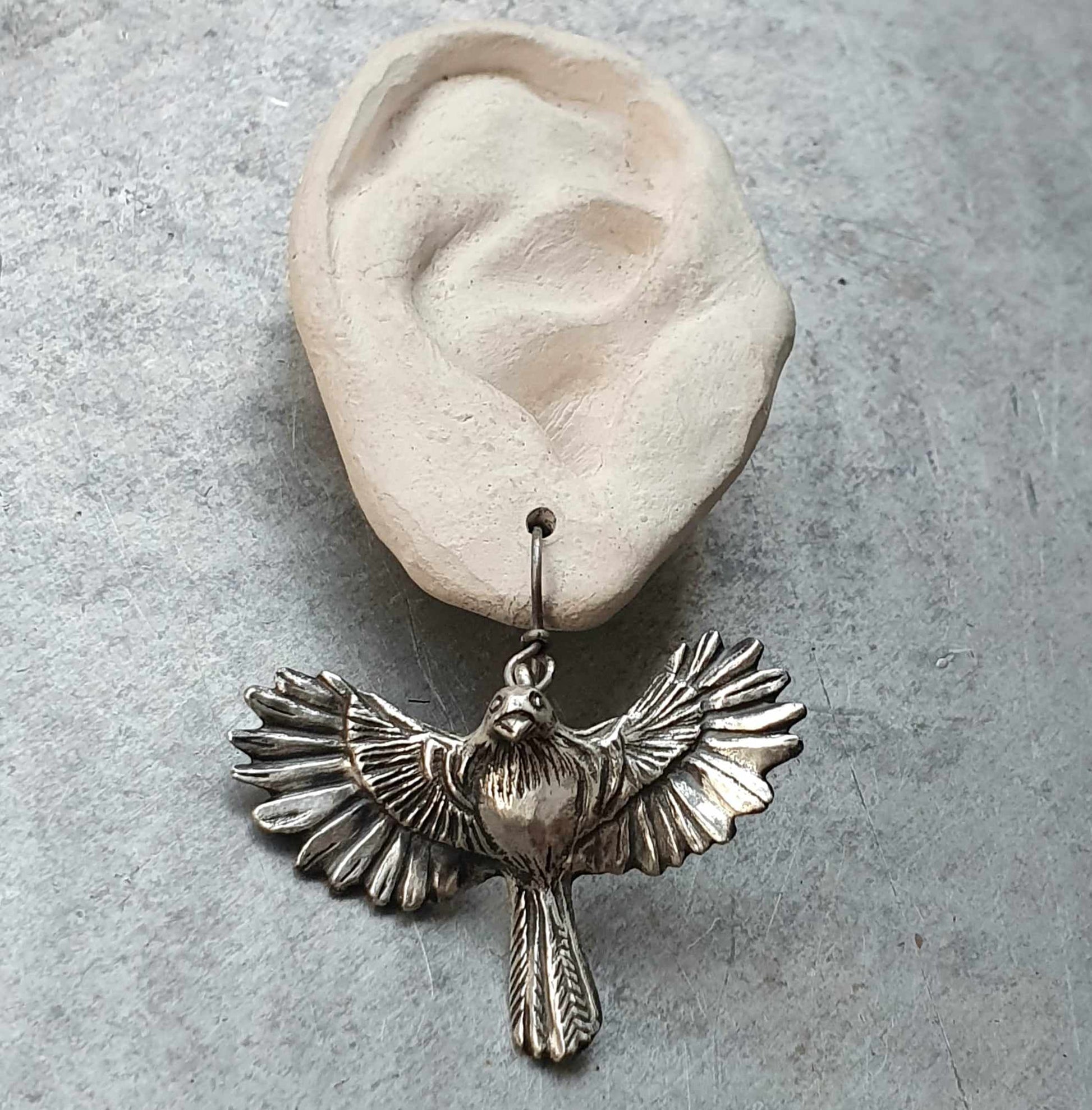 chaffinch earring in silver and titanium