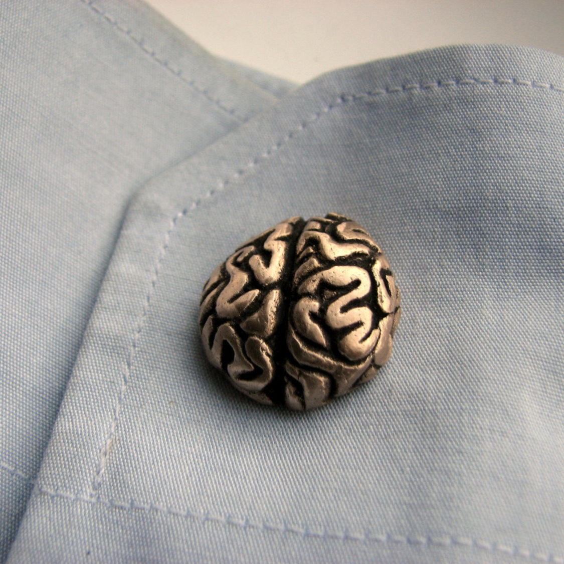 handcrafted bronze brain cufflink