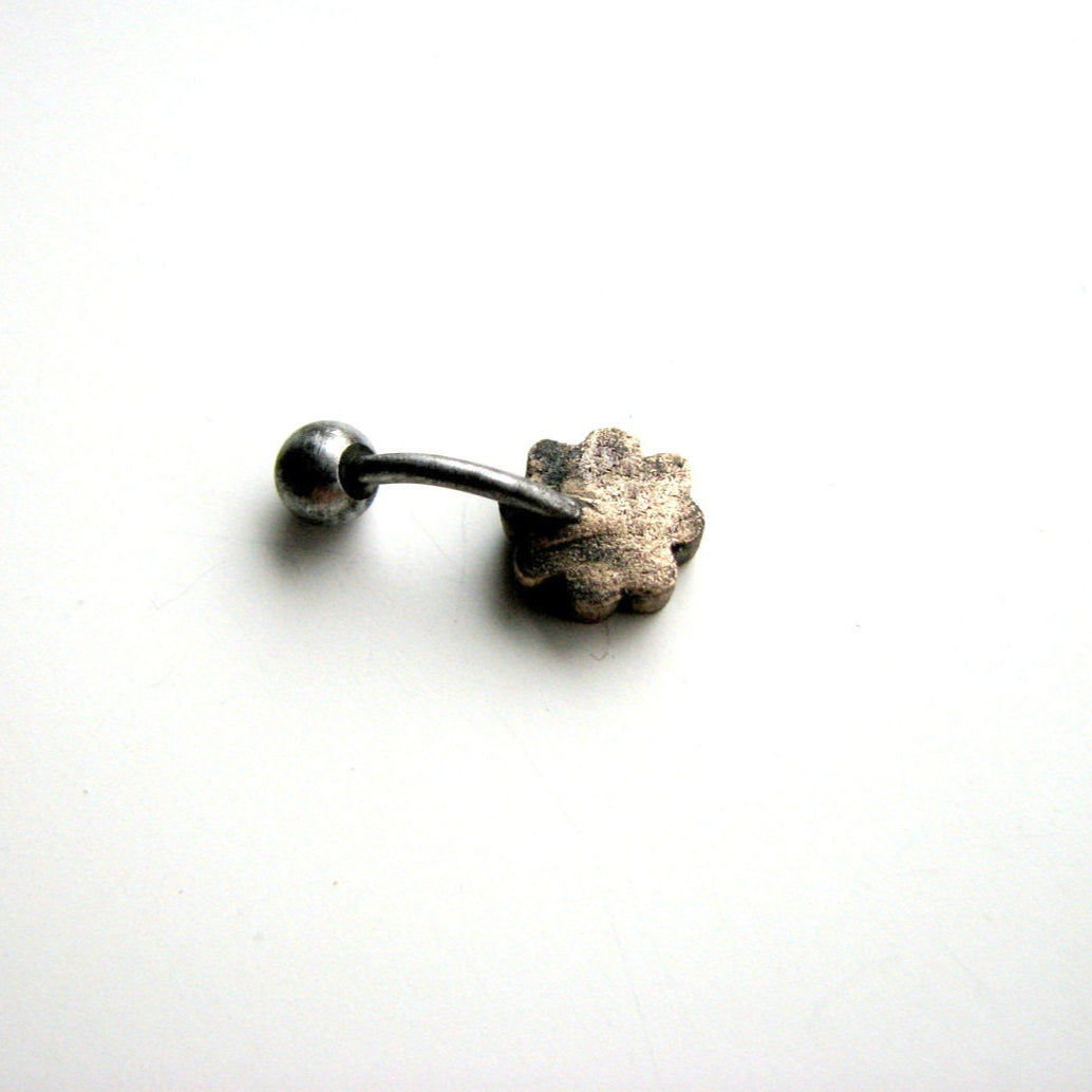 backside, titanium and bronzefour leaf clover navel piercing