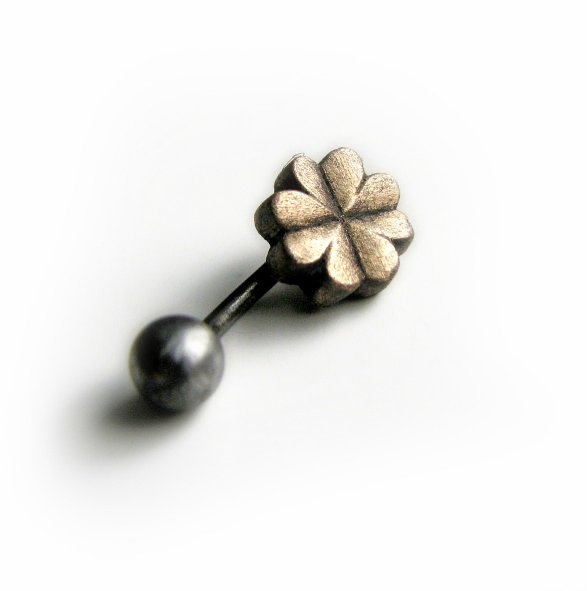 titanium and bronzefour leaf clover navel piercing