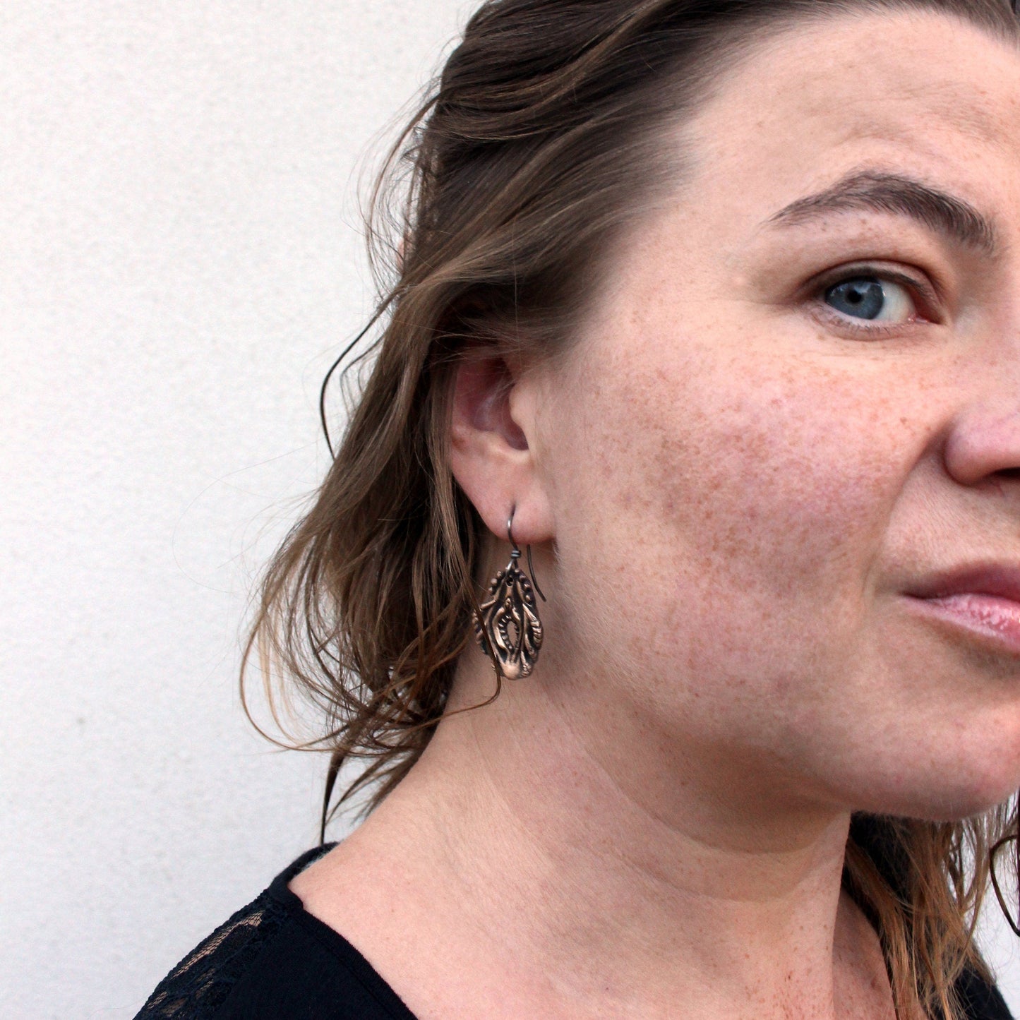 bronze vagina Dentata earrings with hooks made from allergy-safe titanium.
