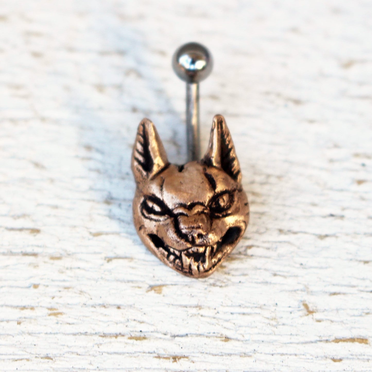 vild katt lokatt navel piercing smycke