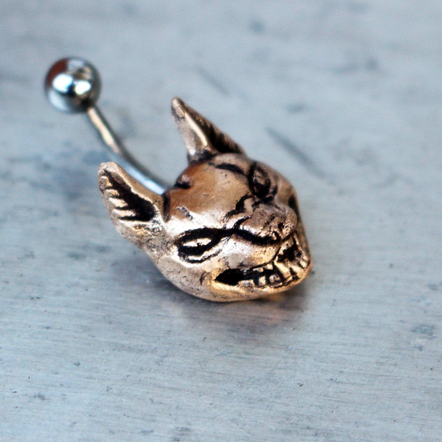 vild katt lokatt navel piercing smycke