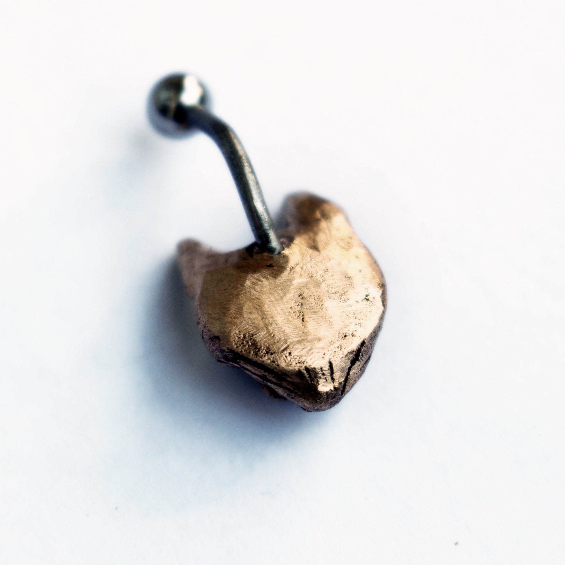 backside, vild katt lokatt navel piercing smycke