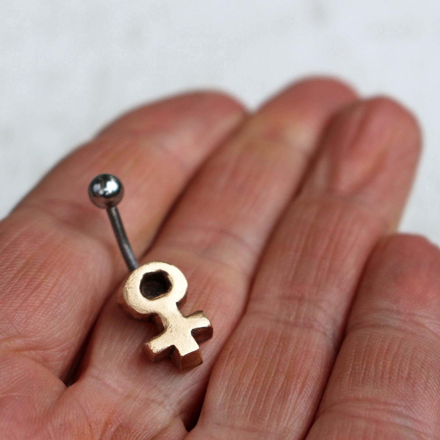 feminist symbol belly jewelry