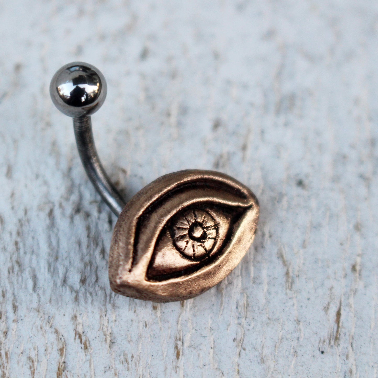 surrealistisk öga navel piercing smycke