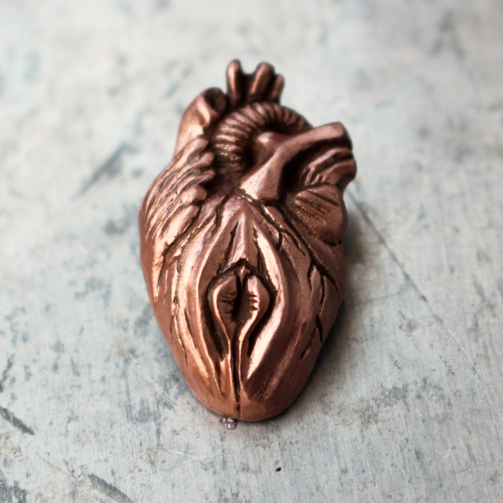 vulva hjärta hybrid smycke