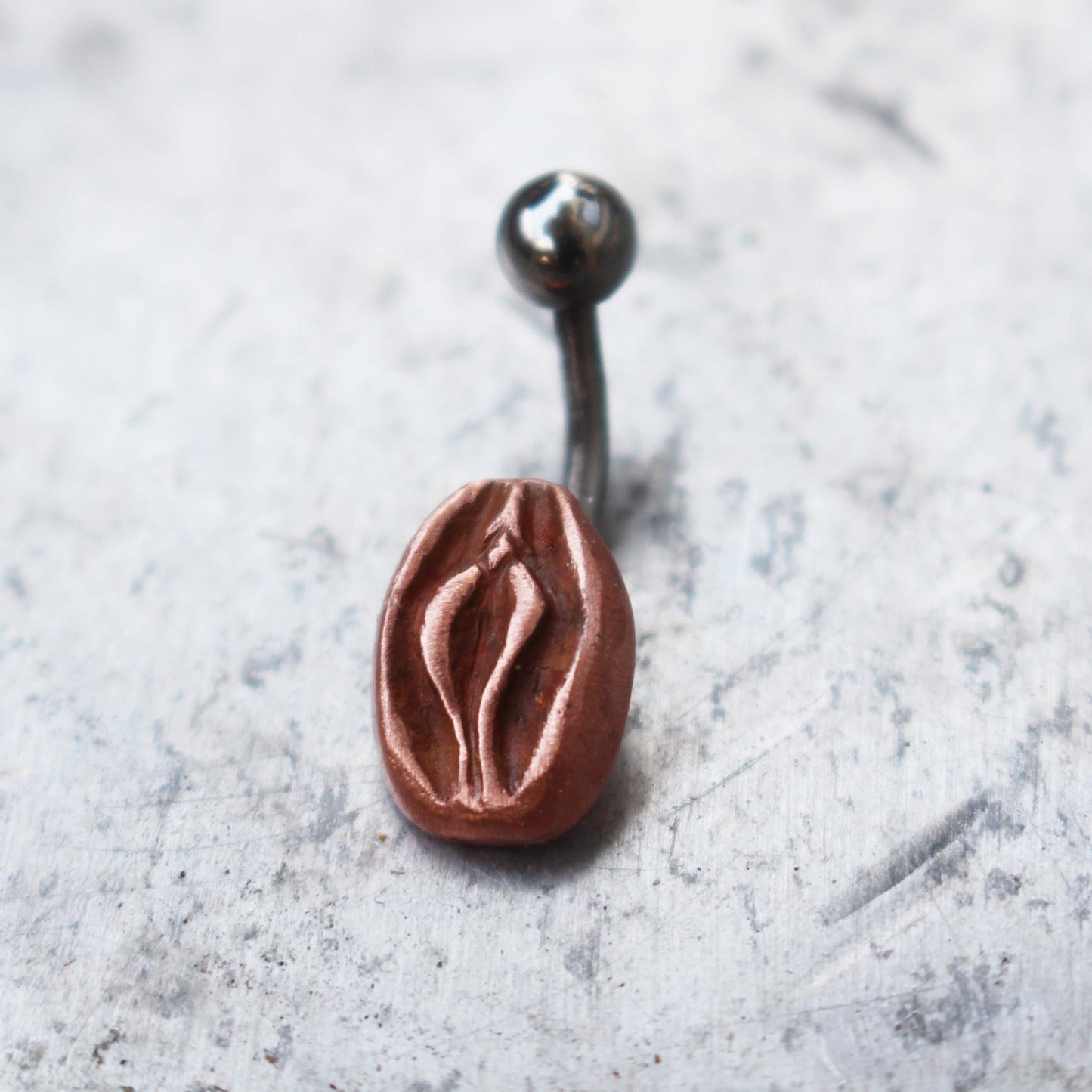 titanium navel piercing with a copper vagina pussy