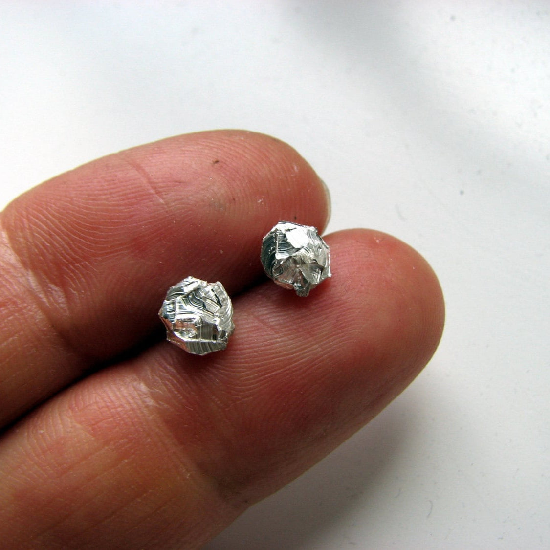 Rough silver pebble earrings