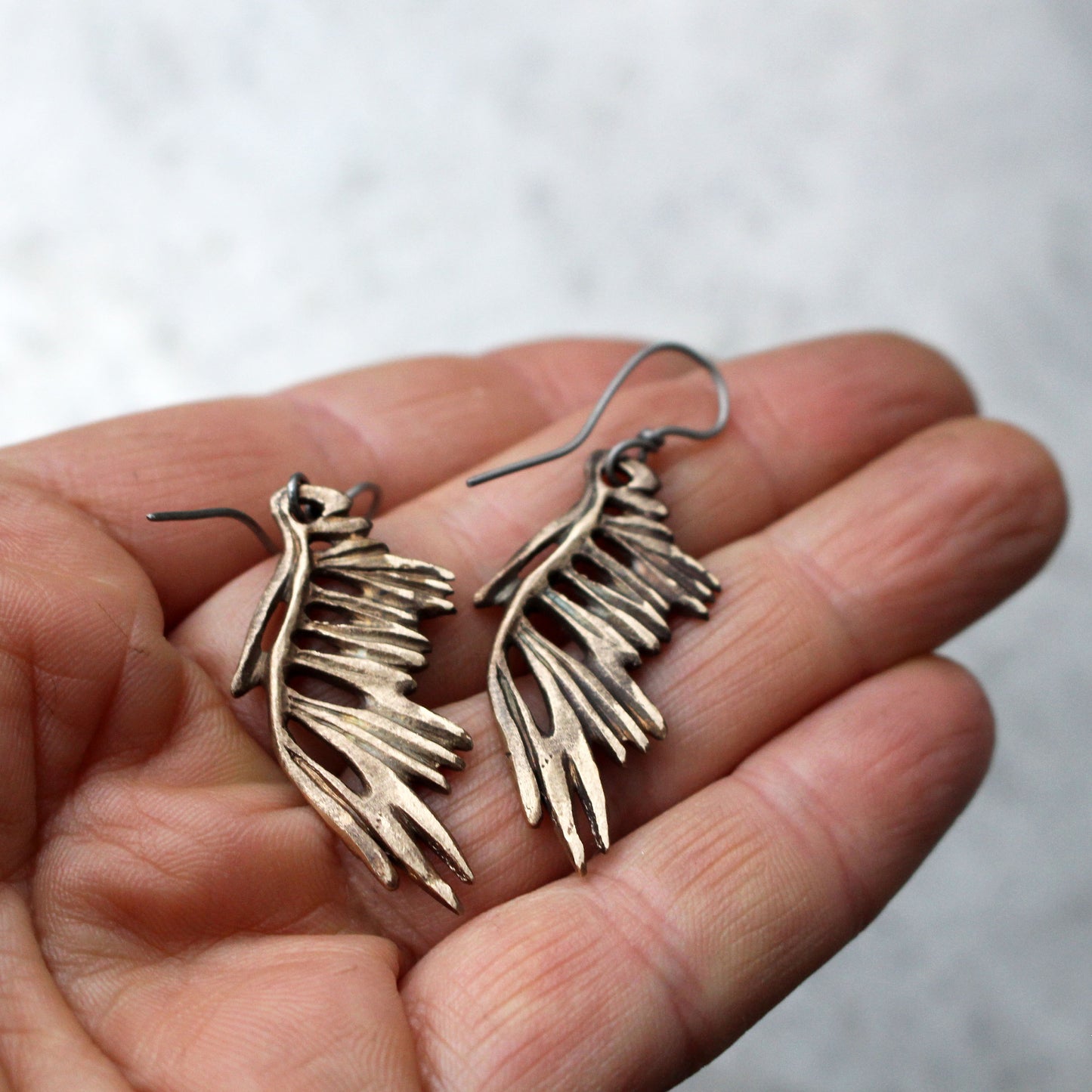 Skeleton wing earrings