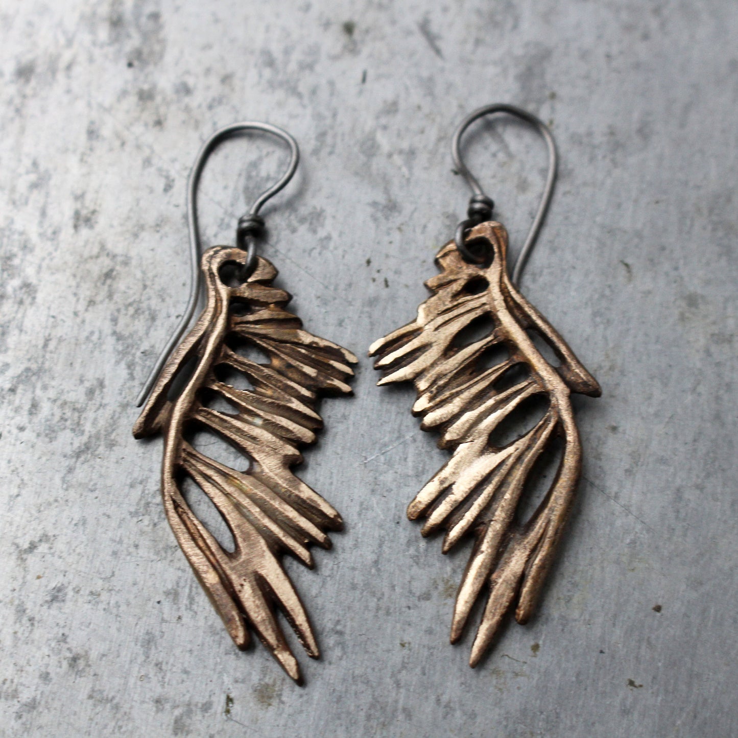 Skeleton wing earrings