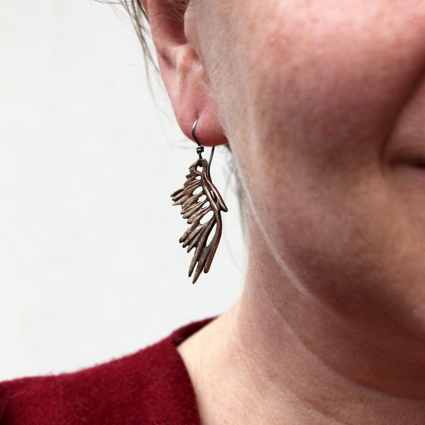 Skeleton wing earrings