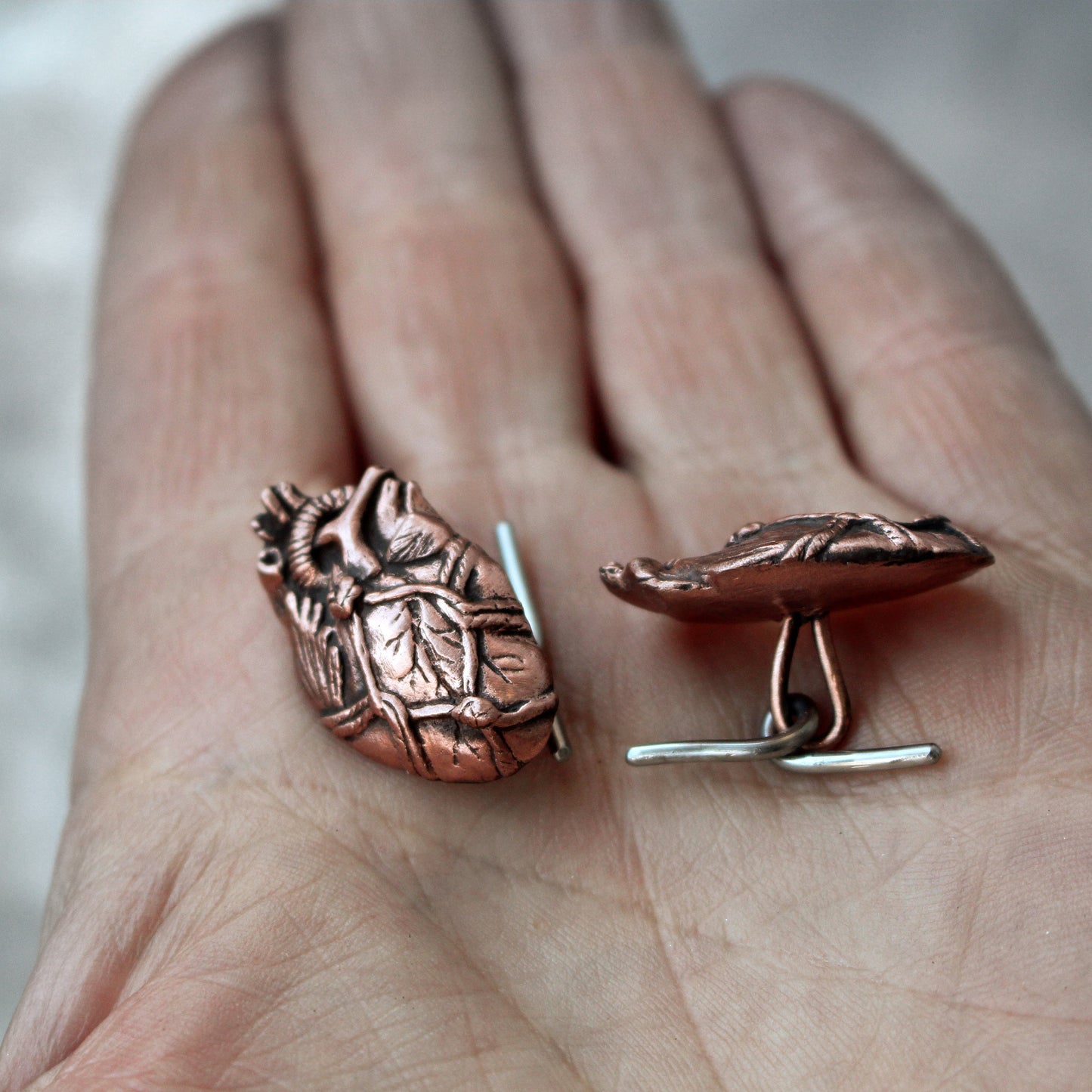 Bound heart cuff links
