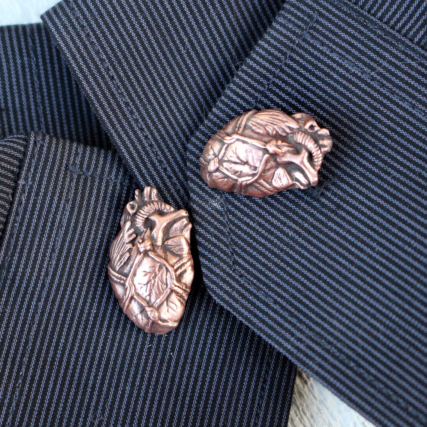 Bound heart cuff links