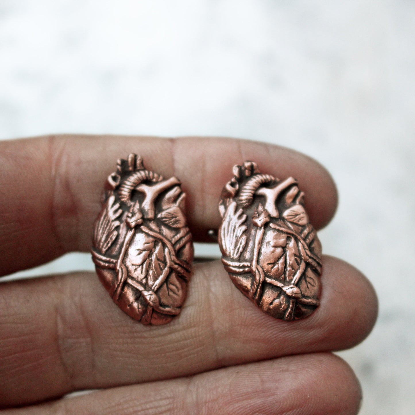 Bound heart cuff links