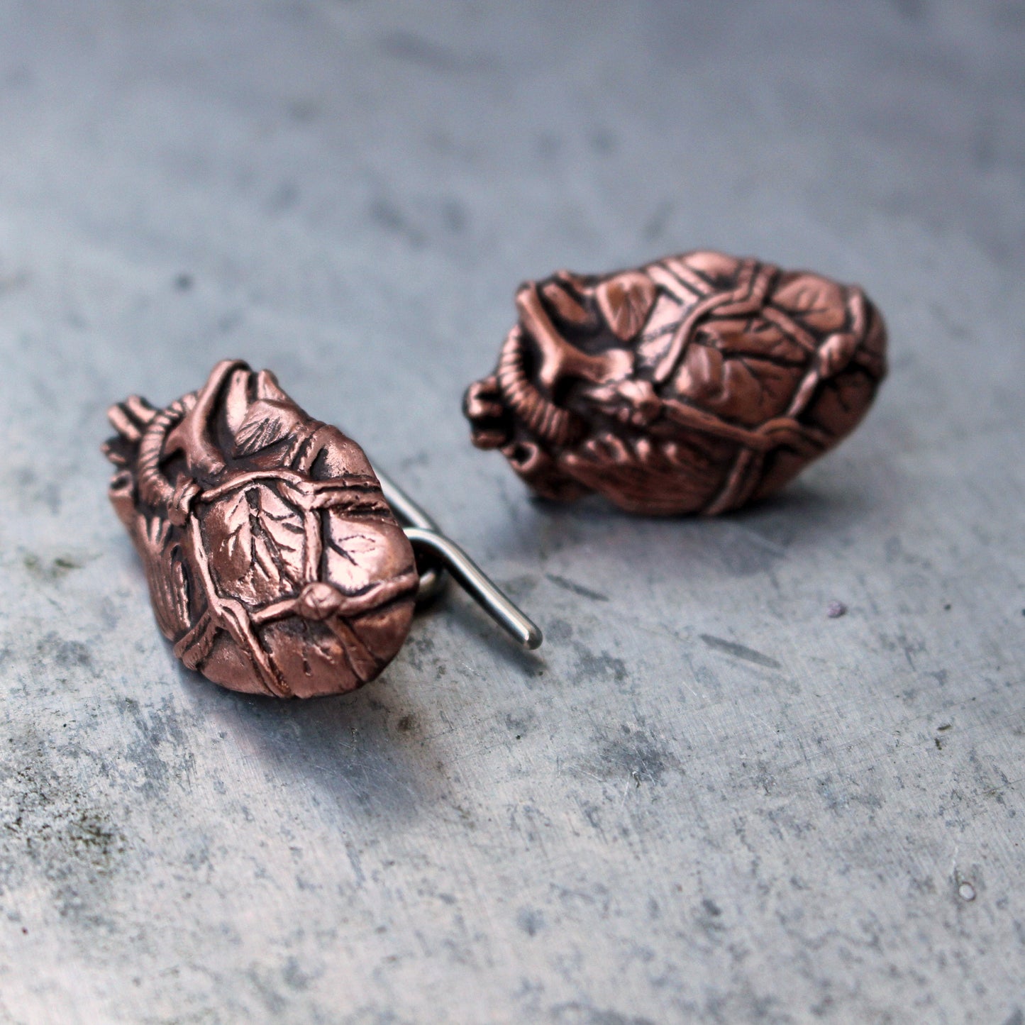 Bound heart cuff links