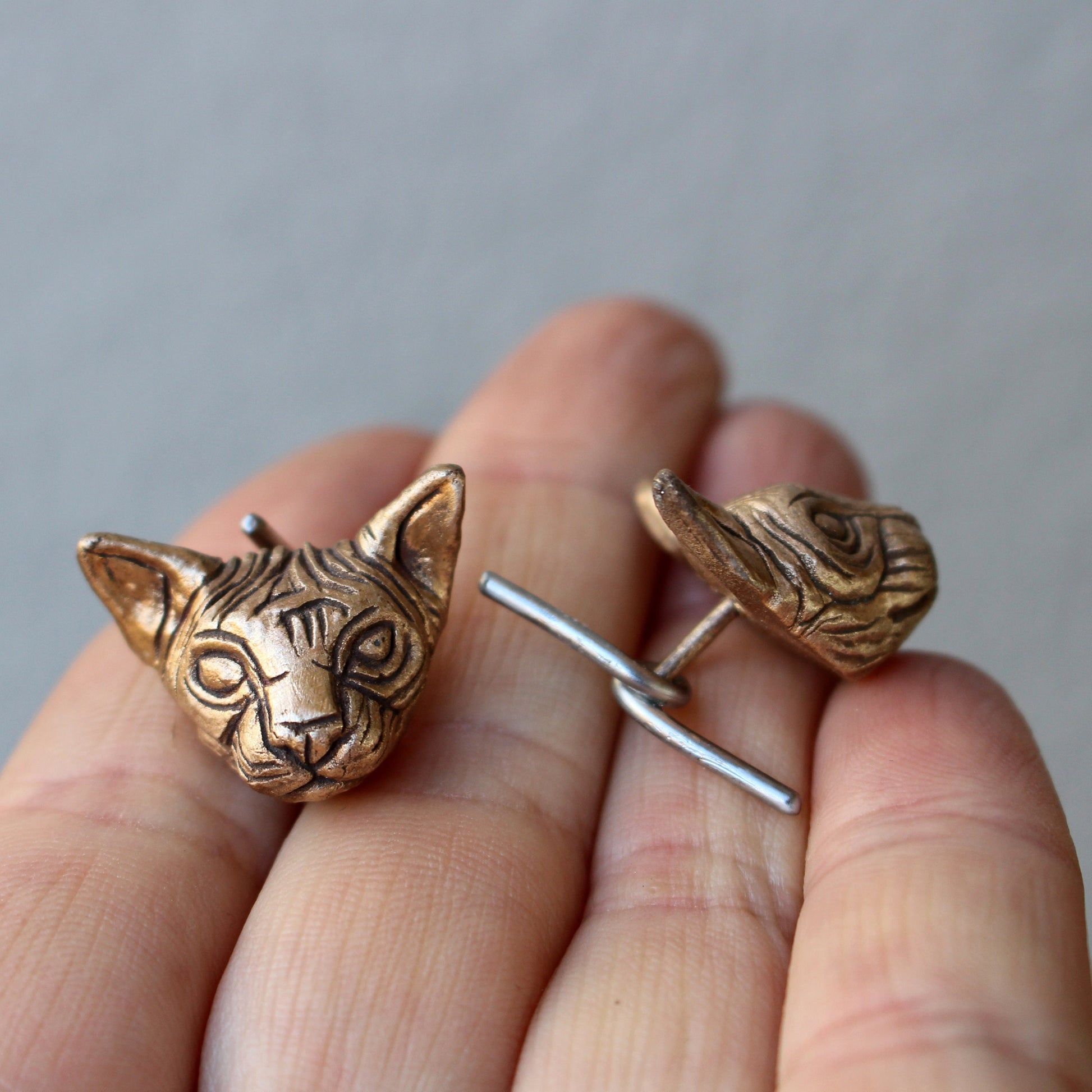 sphynx cat head cuff links in bronze and stainless steel