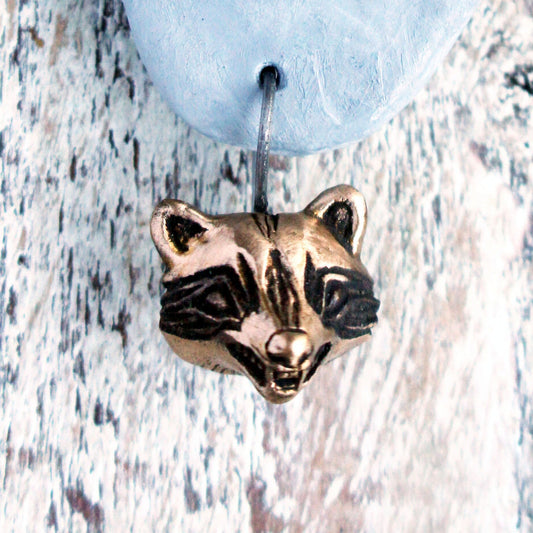 Bronze raccoon head earring