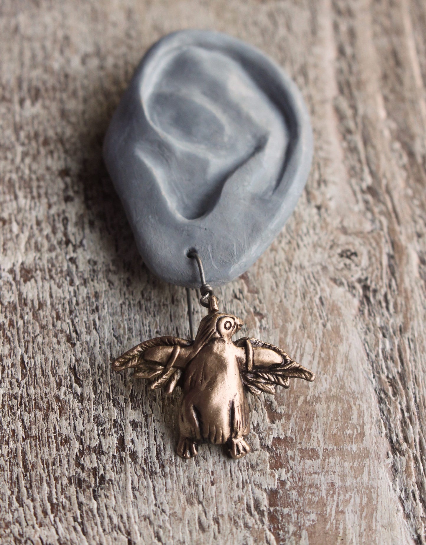 Take flight penguin earrings