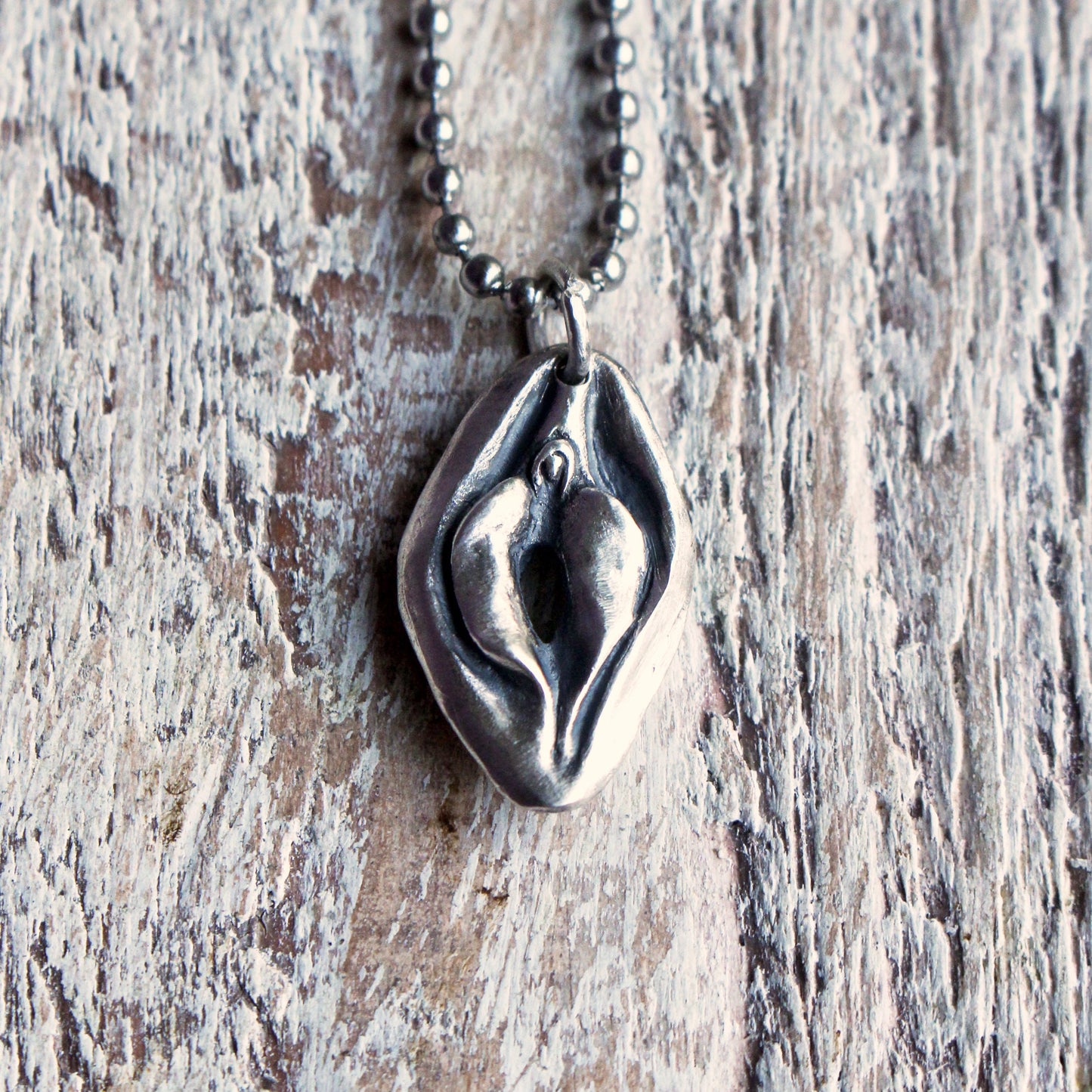 Reversible mouth/vulva halsband