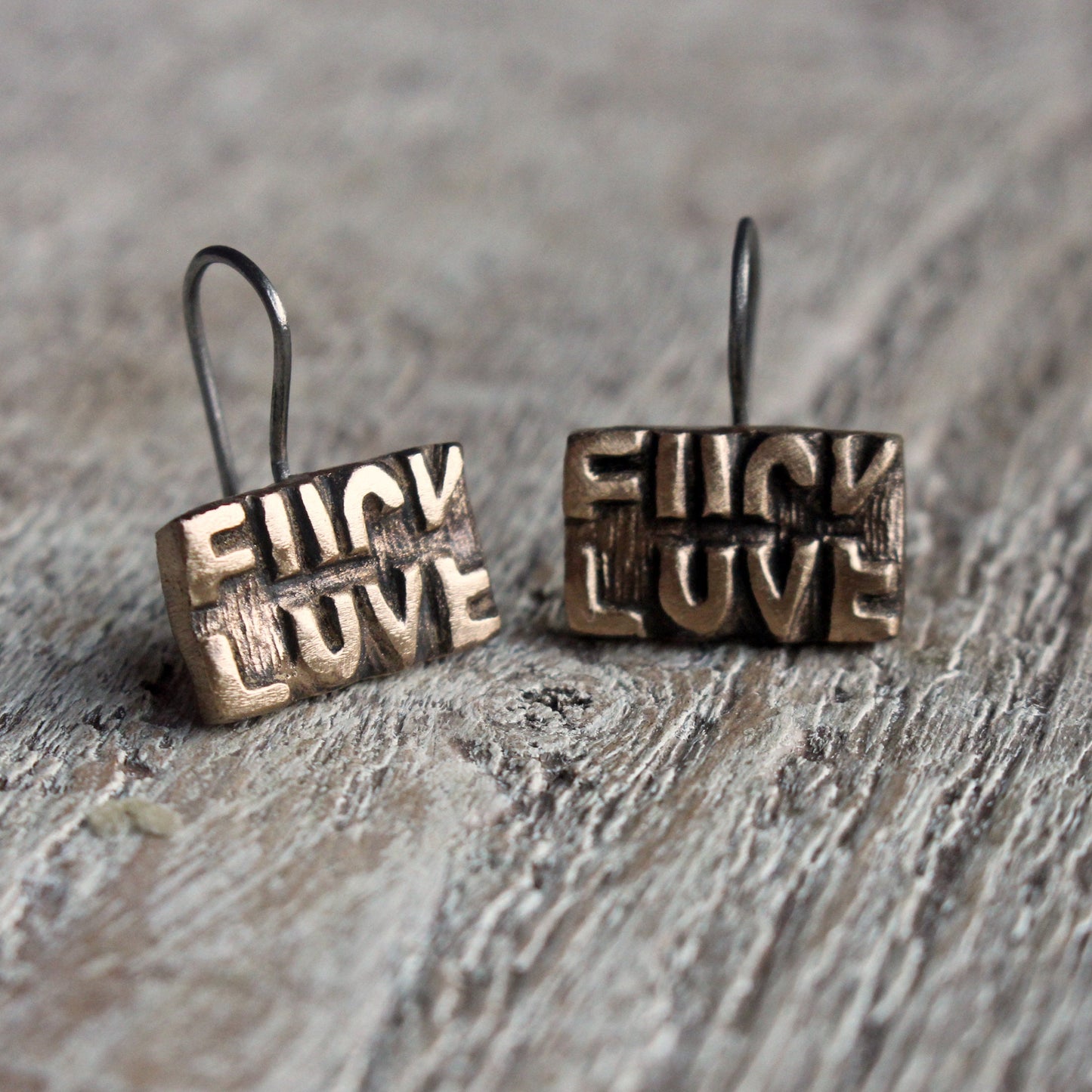 Fuck love earrings