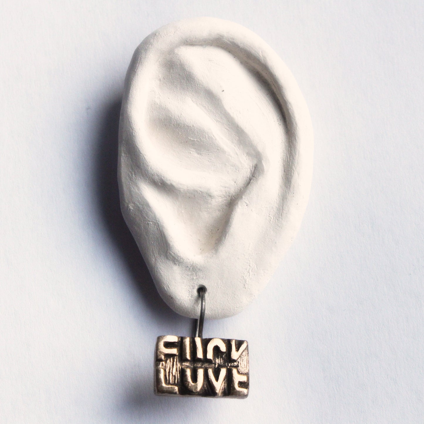 Fuck love earrings