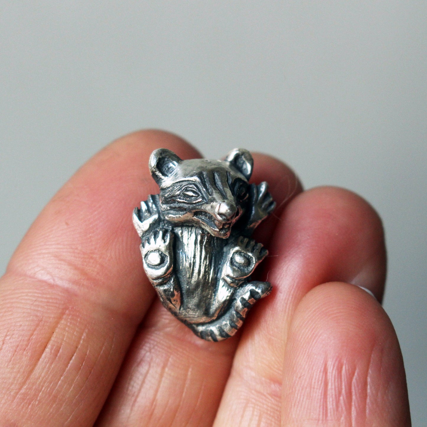 Baby raccoon pendant