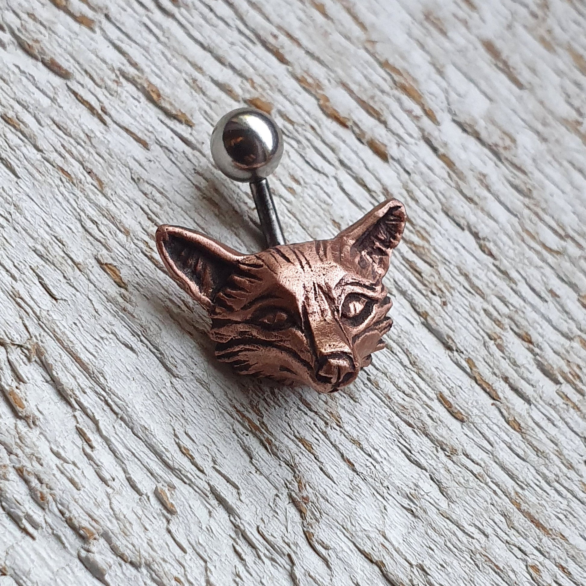 titanium fow head belly button ring