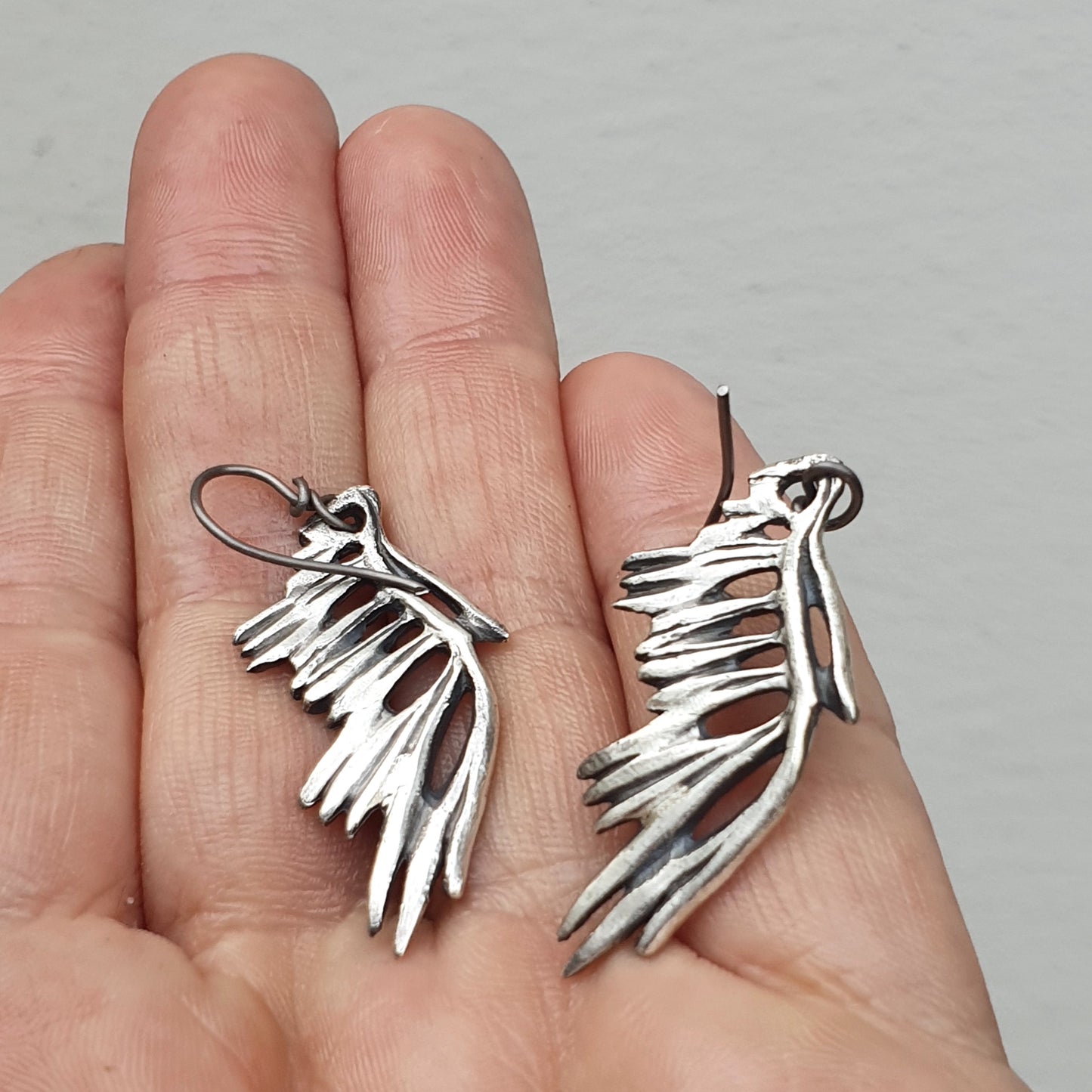 Skeleton wing earrings