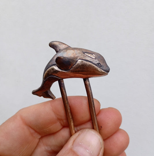 orca hairstick sculpted in bronze
