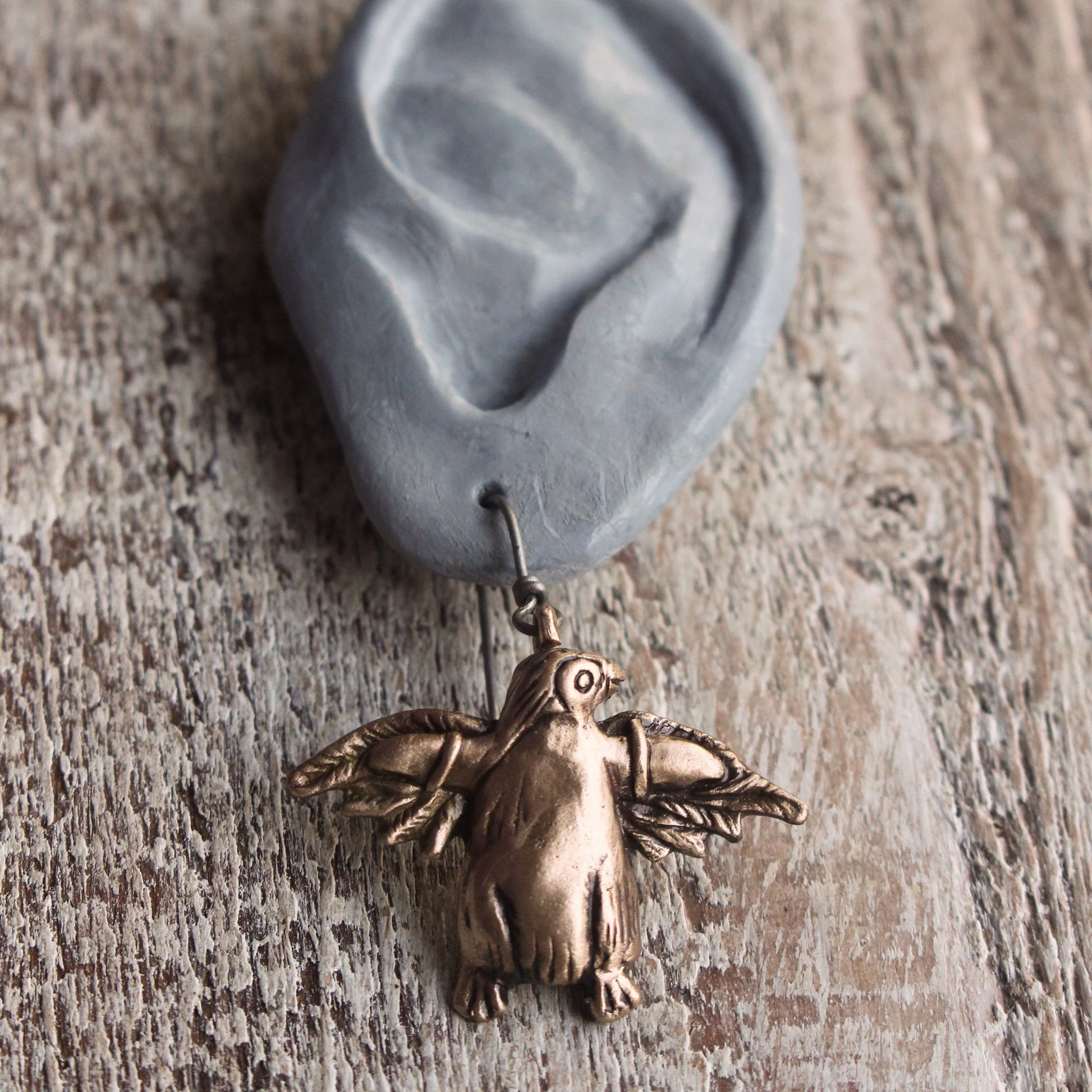 örhängen, pingvin med fågelvingar