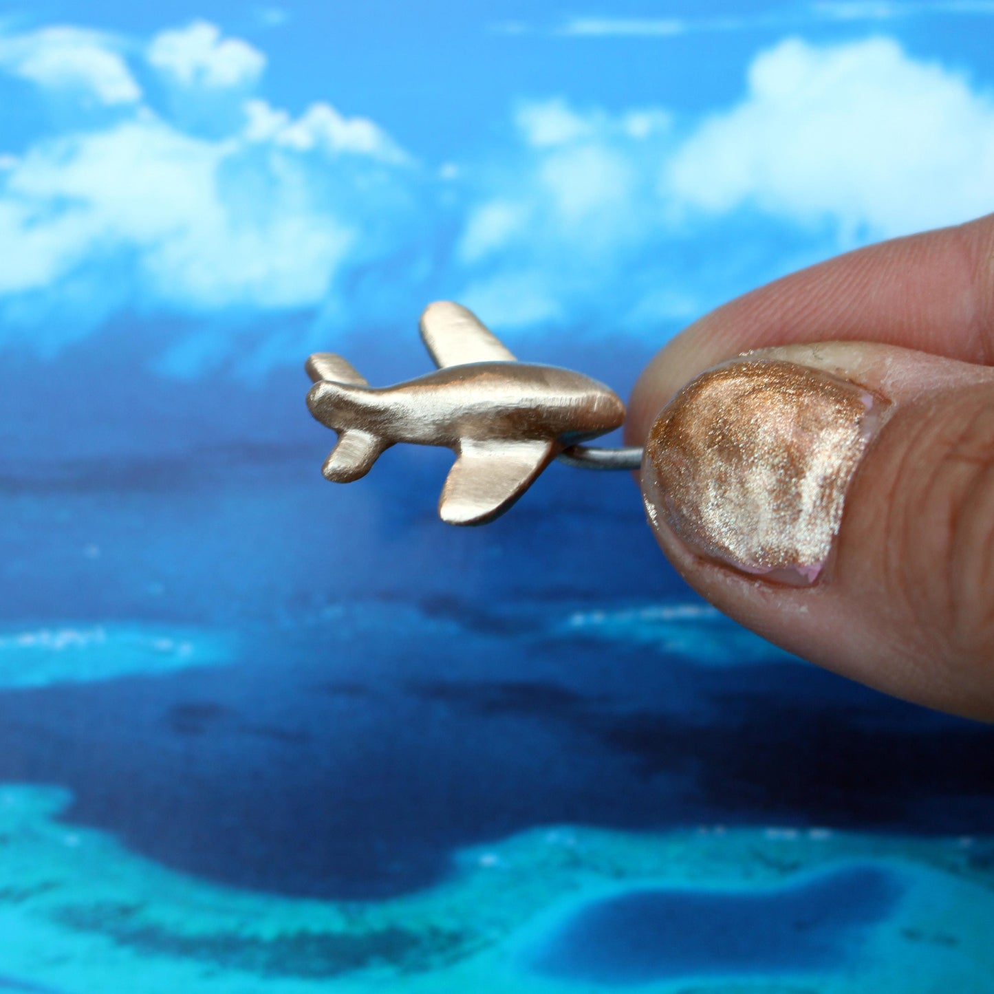 airplane belly button ring iercing jewelry with a small airplane handmade in bronze
