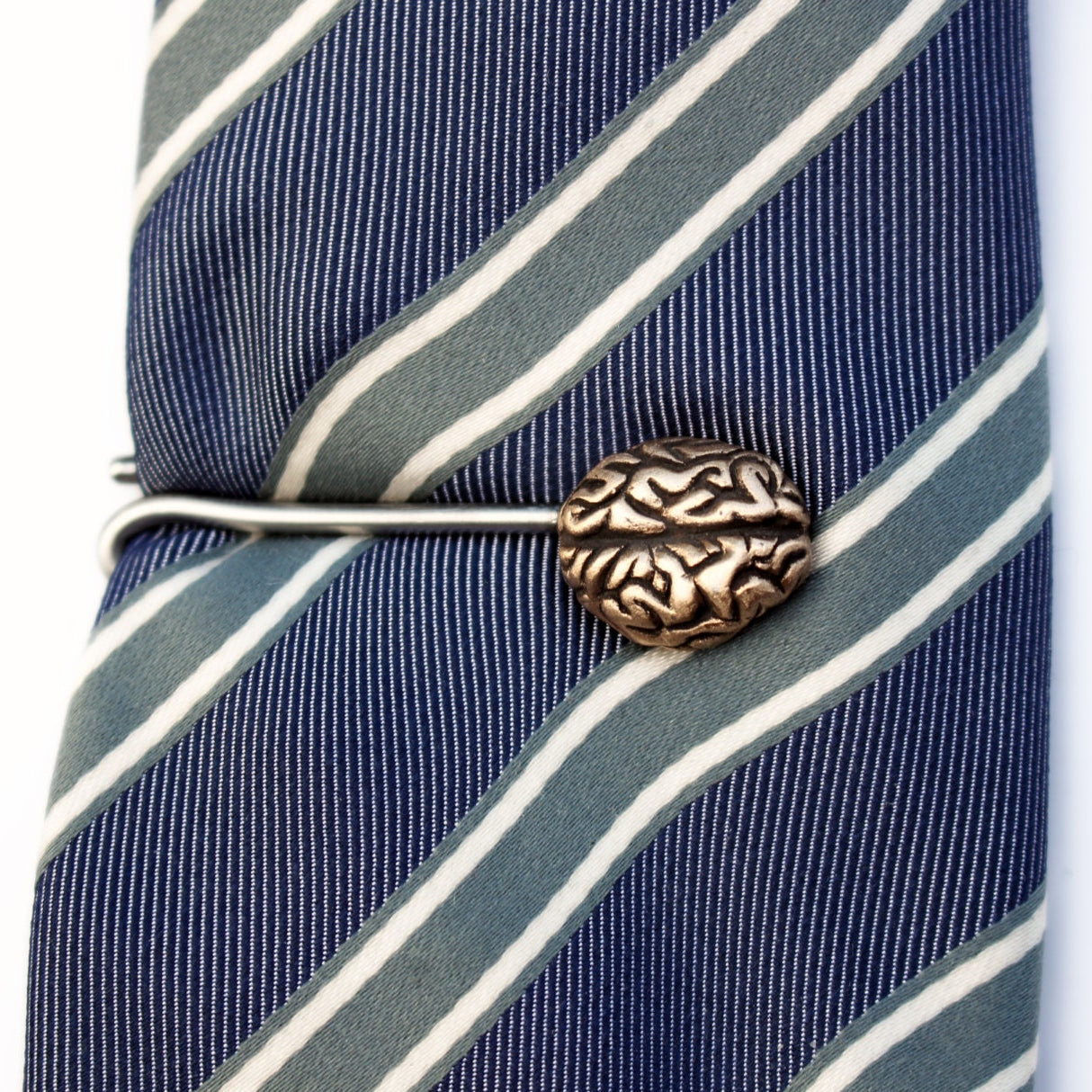handcrafted brain tie bar in steel and bronze
