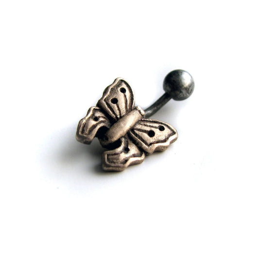 A belly button ring with a small butterfly sculpted in bronze on one side of the curved barbell.