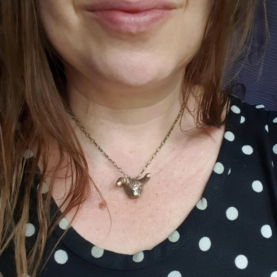 dicky the surreal sphynx cat with cocks as ears, handmade necklace in bronze