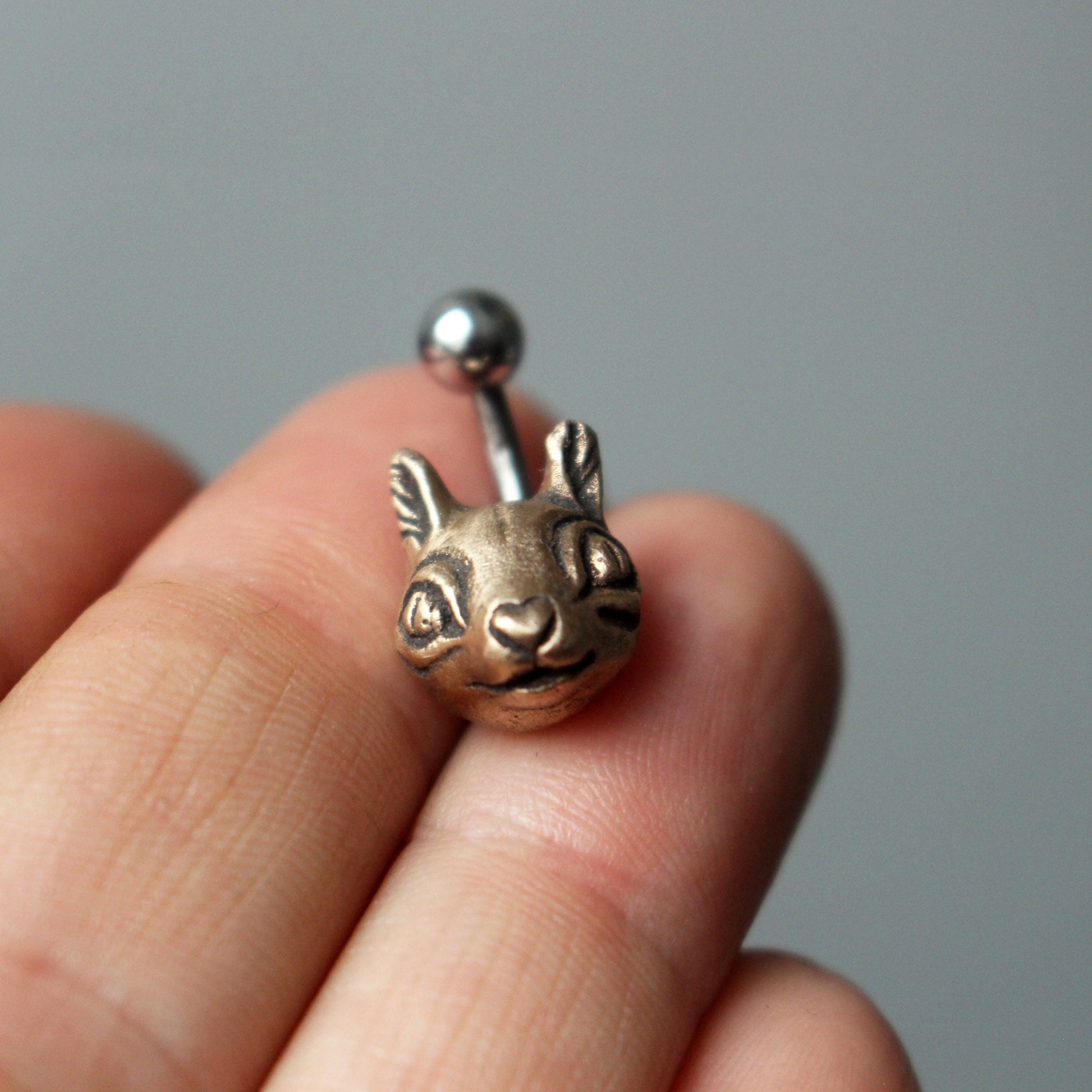 ekorre navelpiercing smycke