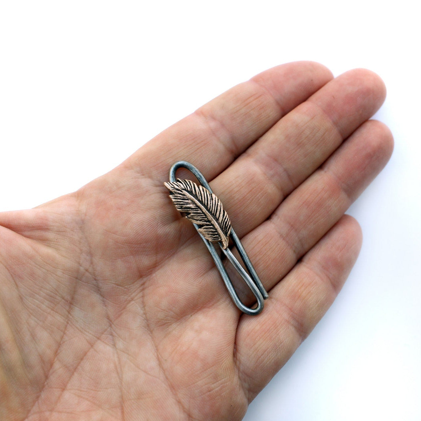 Fjäder slipsklämma i brons och rostfritt stål