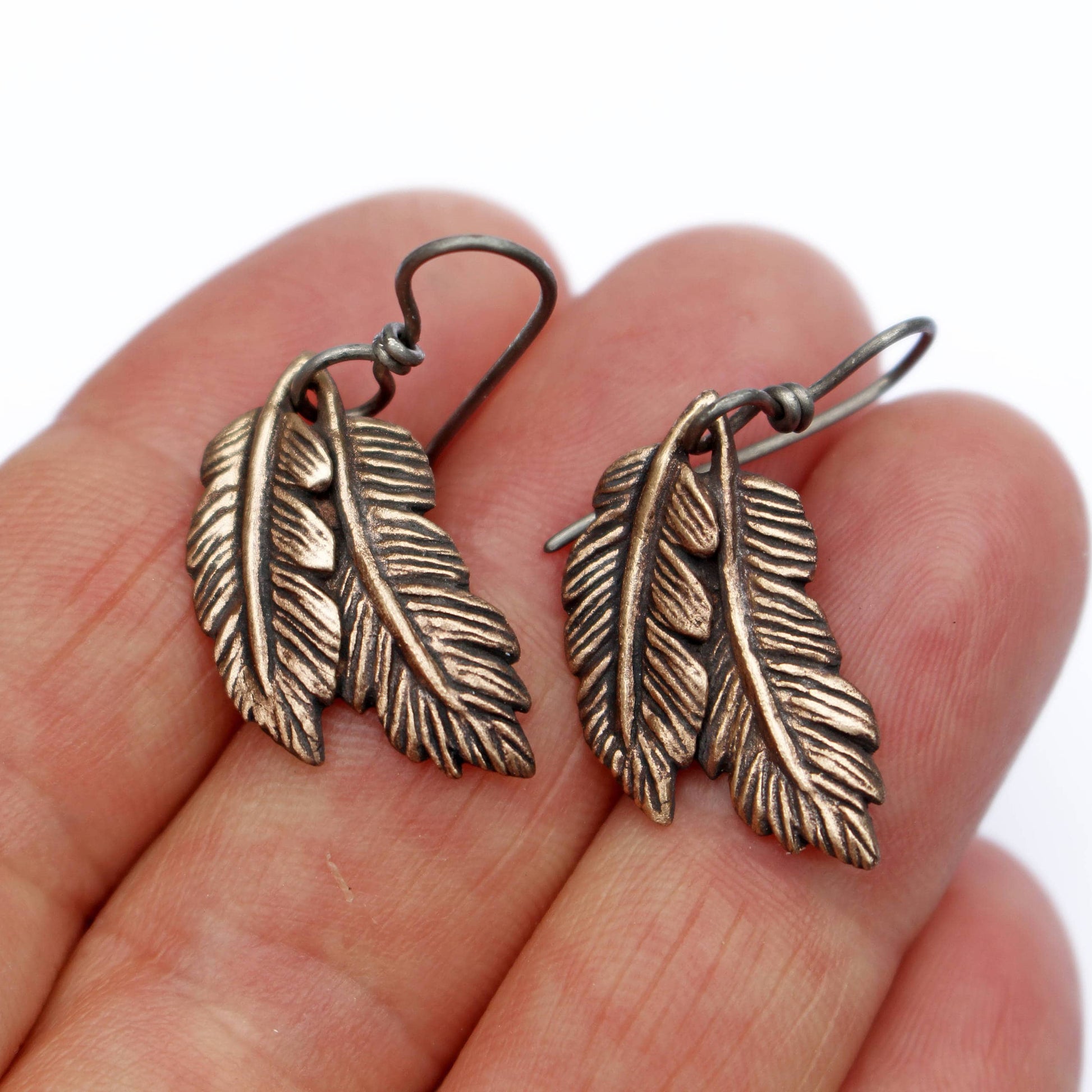 handmade feather  titanium niobium earrings