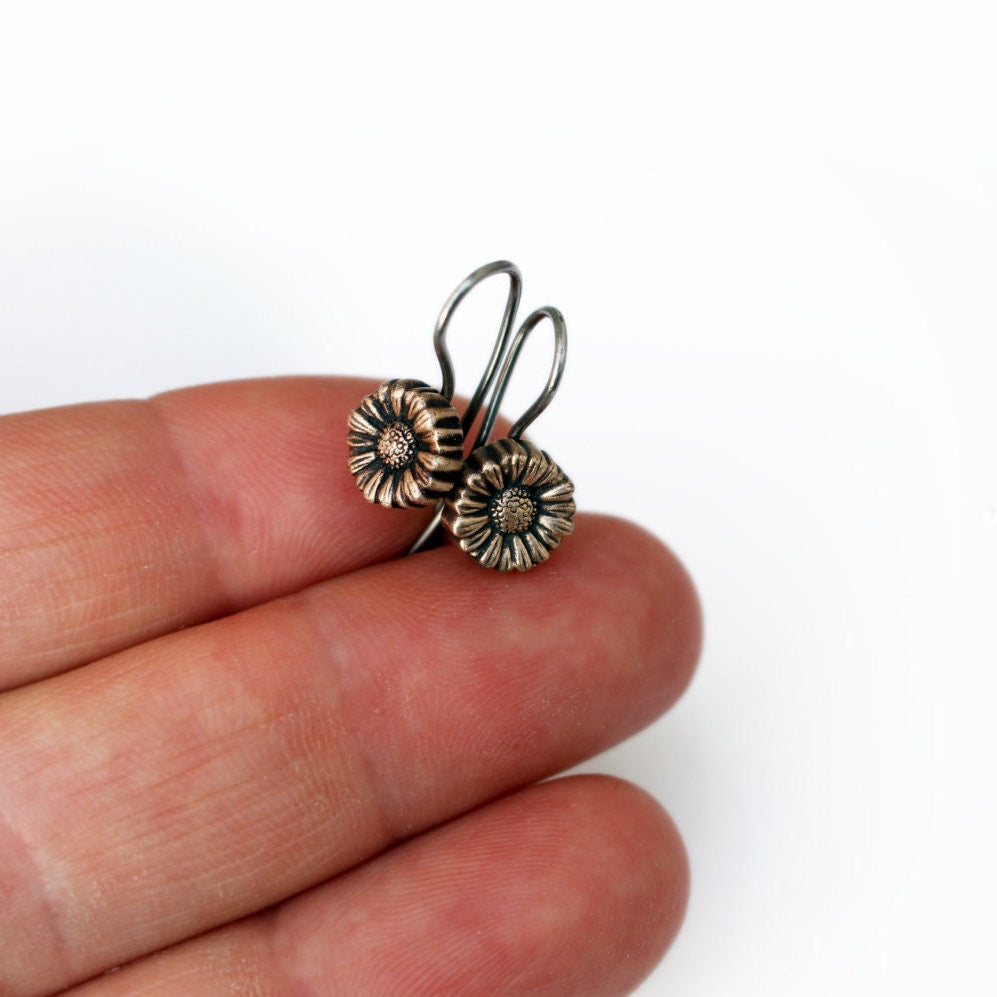 hängande solfjäderörhängen