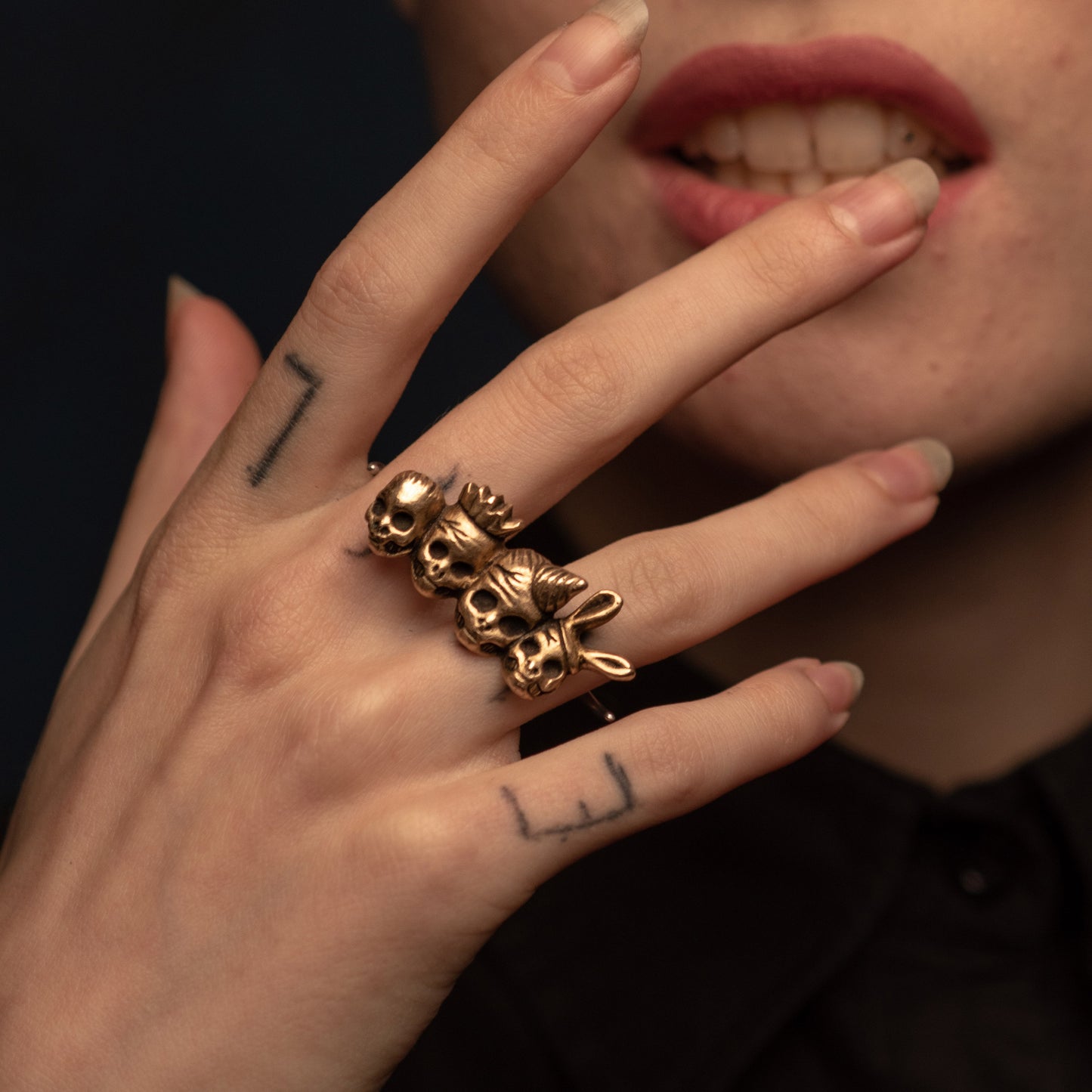 The party must go on knuckle duster ring