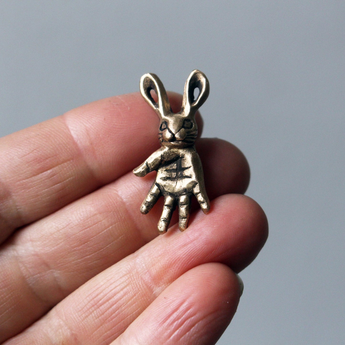 kanin huvudfoting skulptur berlock i brons