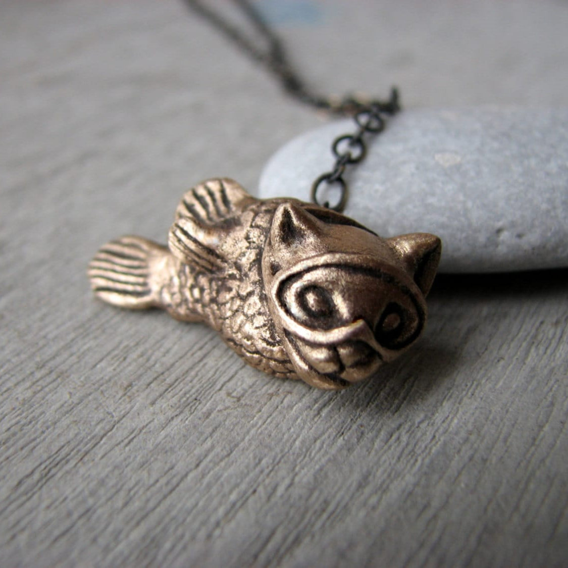 Bronze kattfish pendant