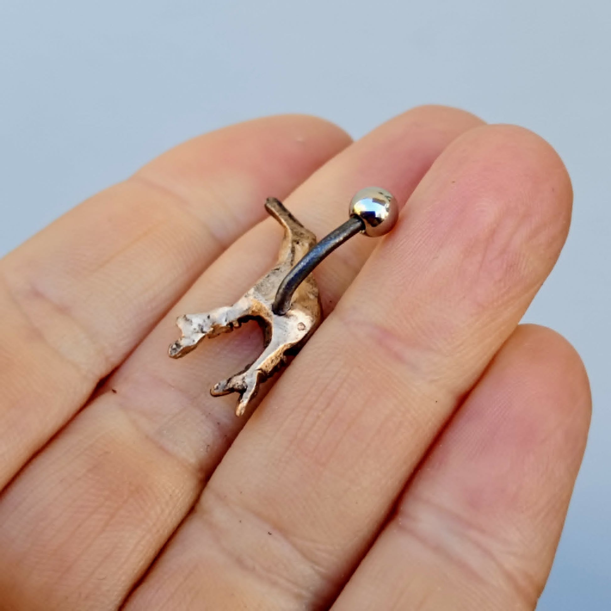 kiwifågelnavel piercing smycke baksida
