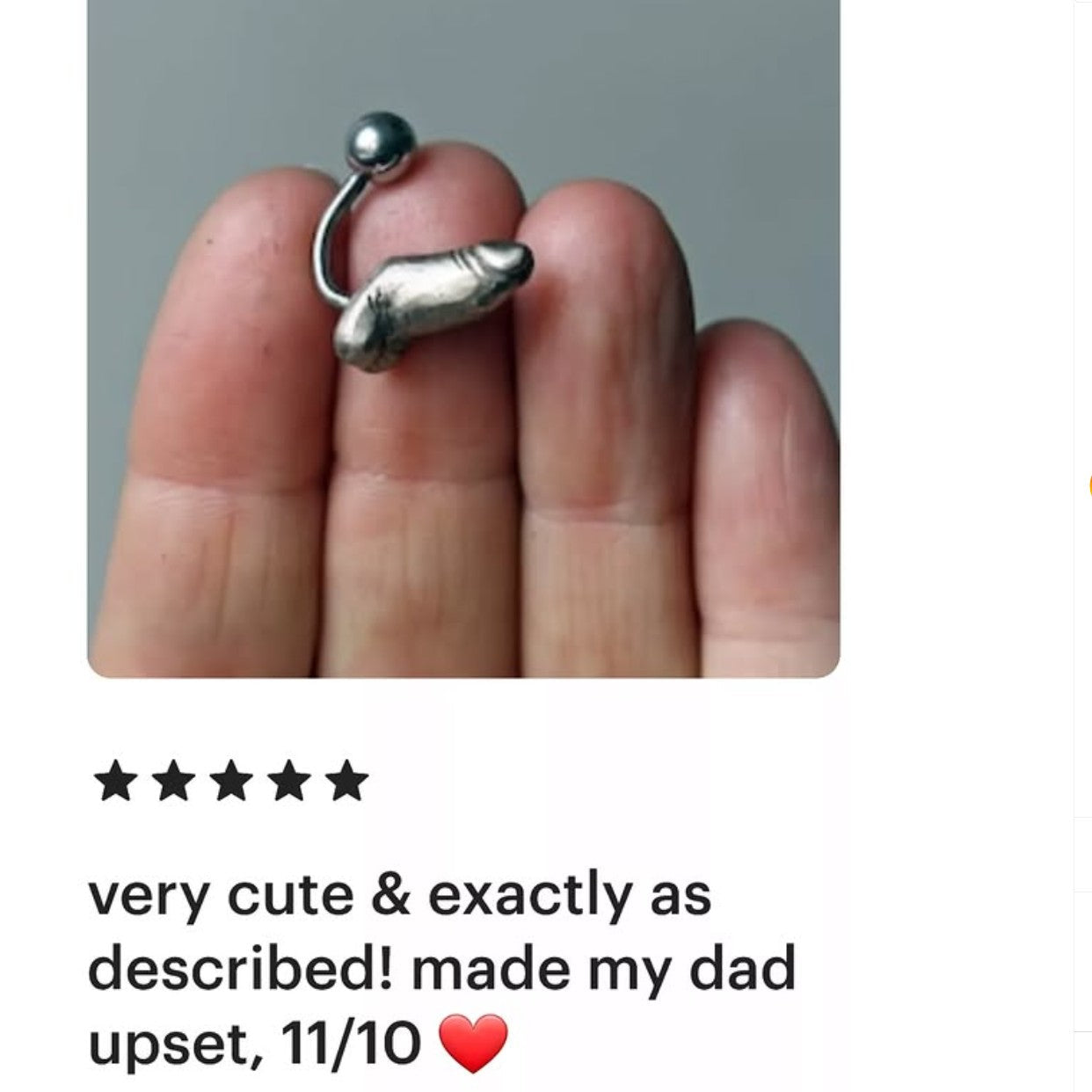 recension av navel piercing smycke med en liten miniatyr kuk