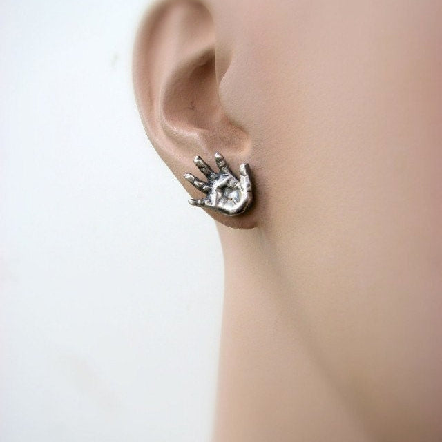 miniatyr händer i silver o niobium