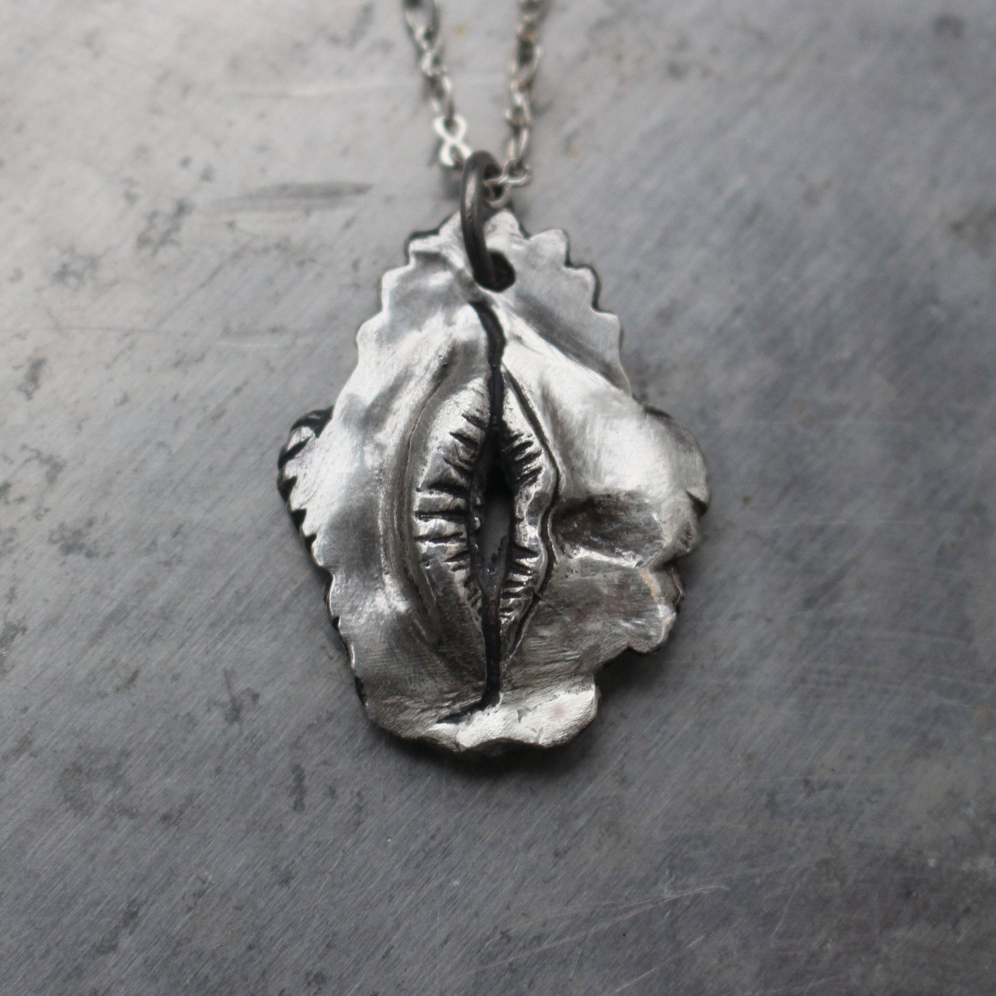 mout side of reversible vagina dentata necklace