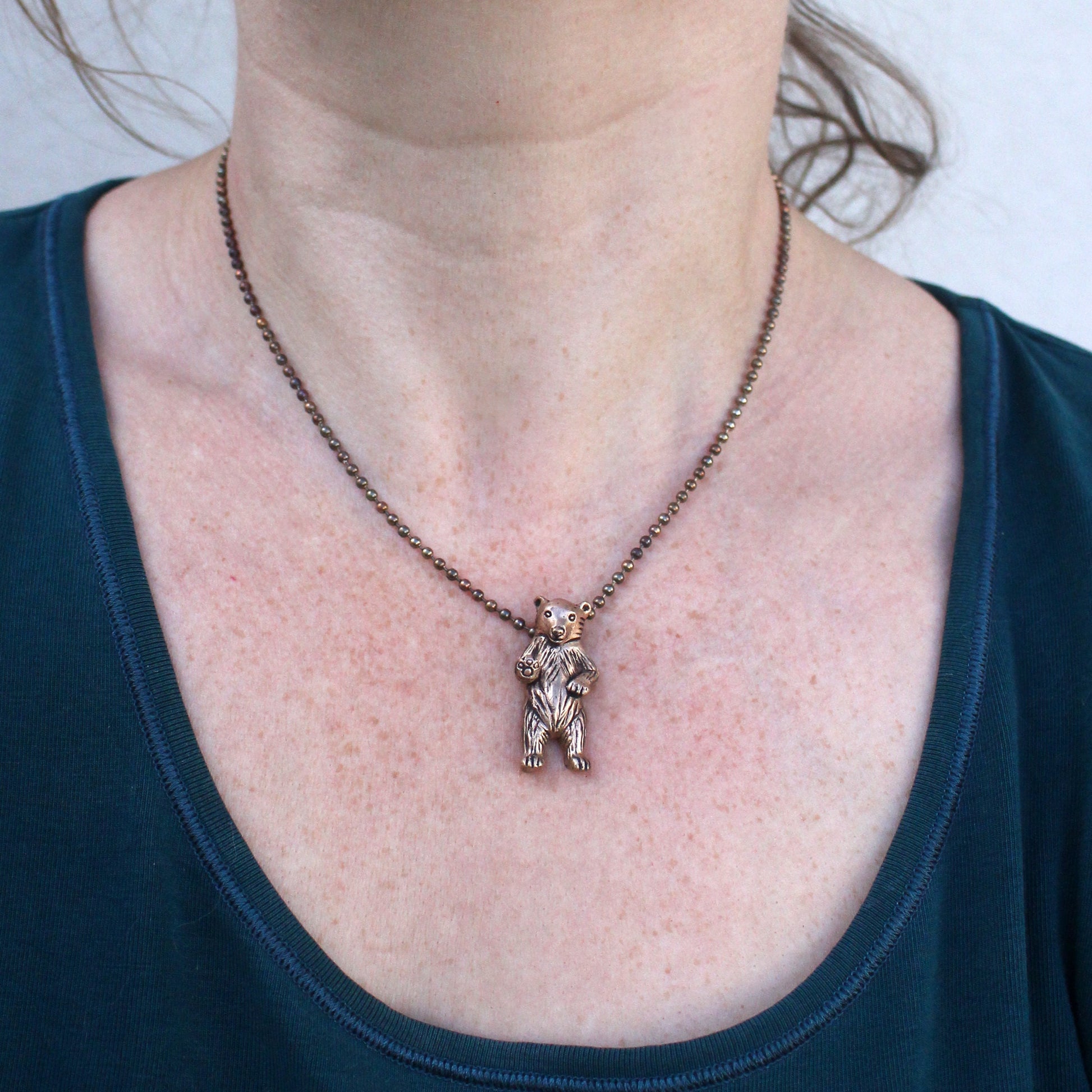 nallebjörnhalsband i brons